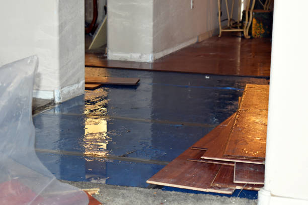 Professional Emergency Water Damage Restoration technician working in Smithfield, RI